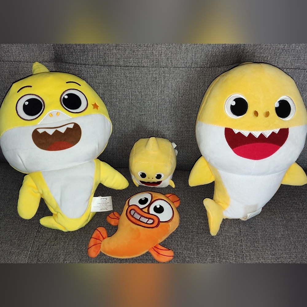 Lot of baby shark characters singing toys
